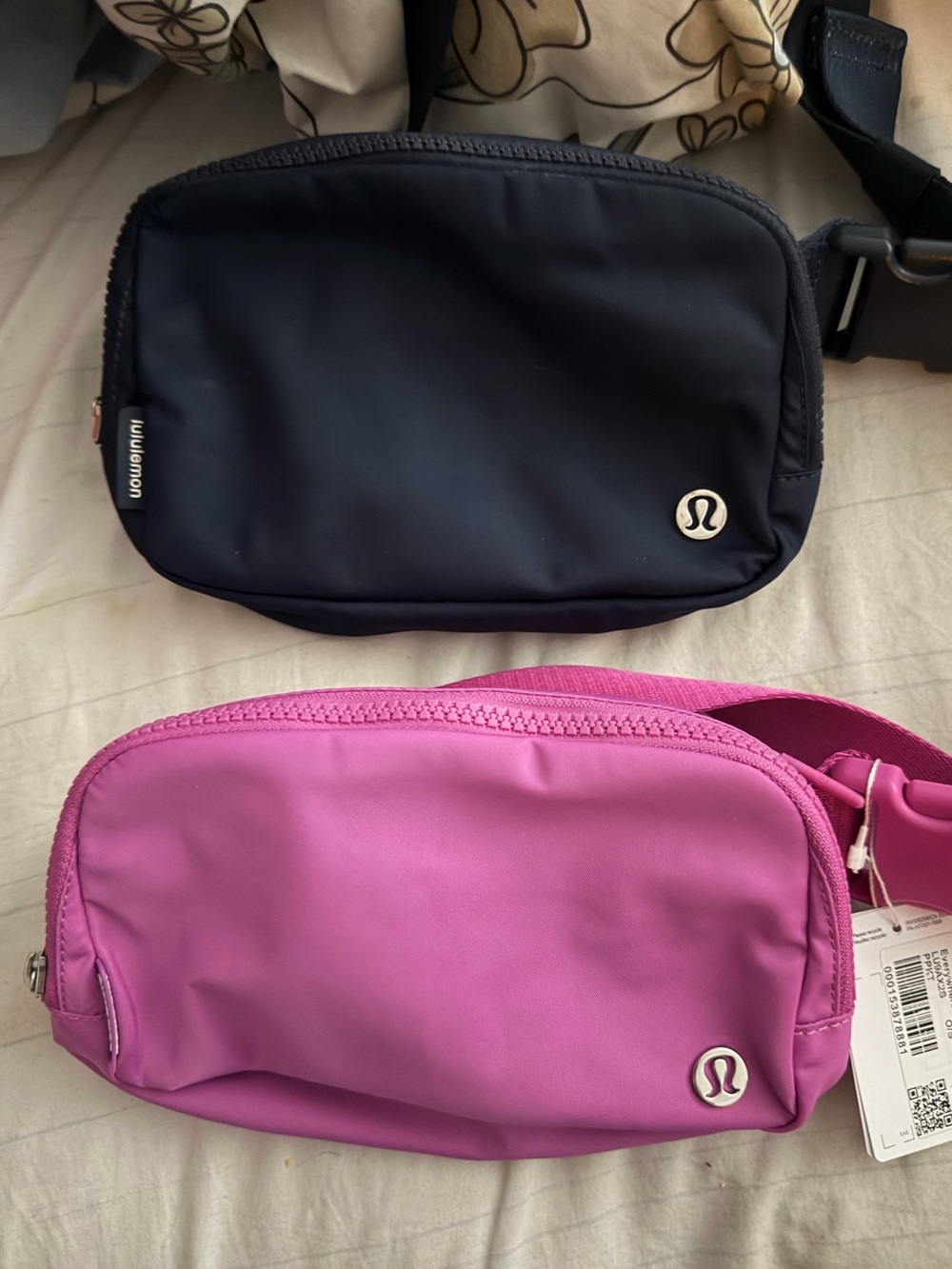 lululemon athletica Bundle Set of Two Navy Blue and Pink Crossbody Belt Bags.